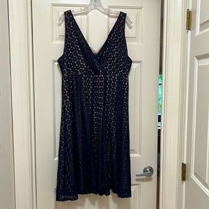 Glamour navy blue and nude dress.